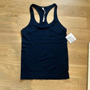 Lululemon swiftly tech race back size 6, navy